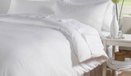 white cotton bedding