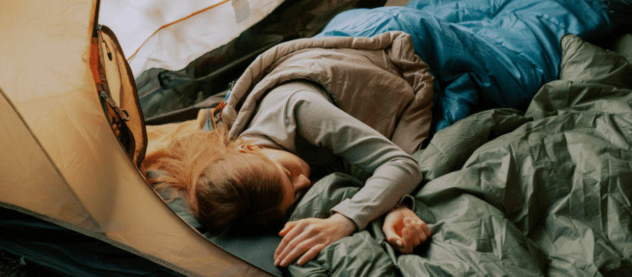 Woman Sleeping In Tent