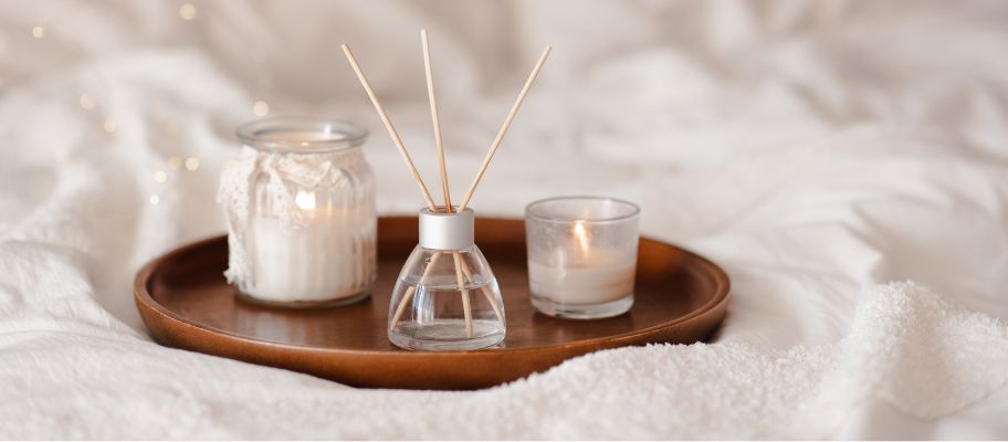 Scented products on a bed